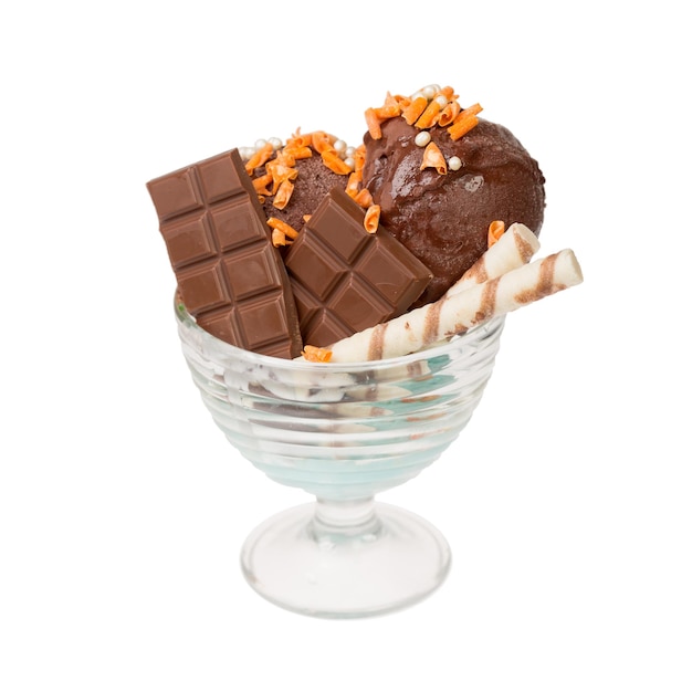 Chocolate ocecream with chociolate bar and wafer rolls