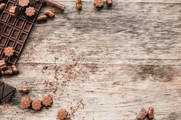 Chocolate and praline on a wooden base