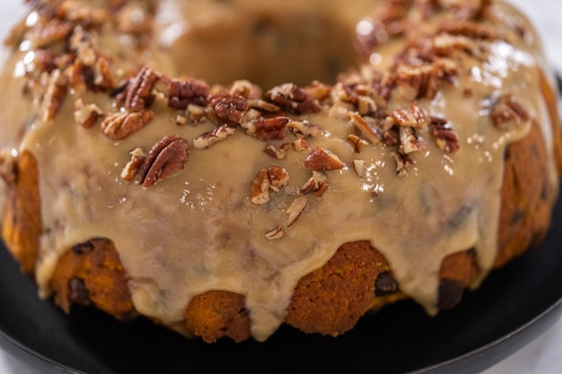 Chocolate pumpkin bundt cake with toffee glaze