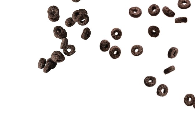 Chocolate rings cereal spill out into a bowl Breakfast