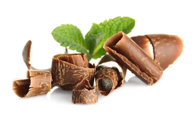 Chocolate shavings with mint on white background