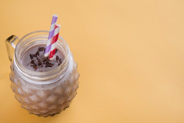 Chocolate smoothie  on fluor color background