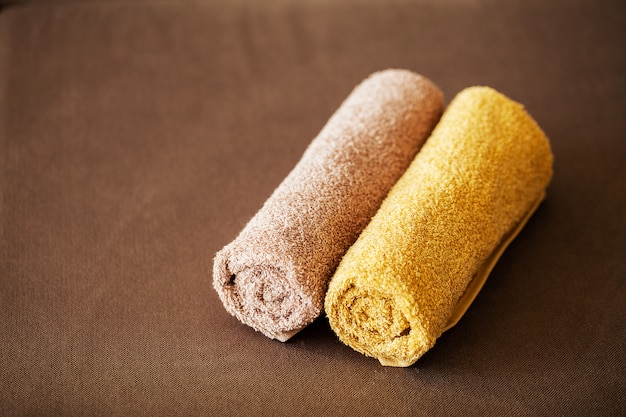 Chocolate Spa . Composition brown towel in hotel room of spa treatment