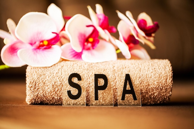 Chocolate Spa Composition brown towel in hotel room of spa treatment