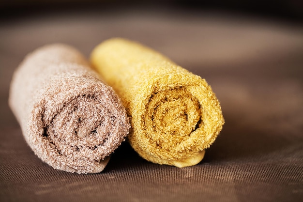 Chocolate Spa Composition brown towel in hotel room of spa treatment