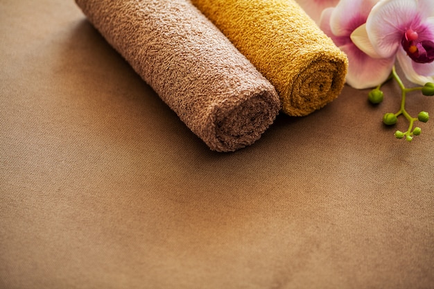 Chocolate Spa . Composition brown towel in hotel room of spa treatment