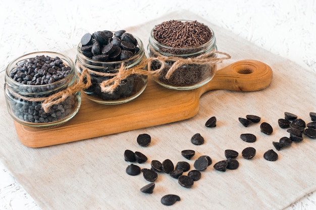 Chocolate sprinkles in glass jars