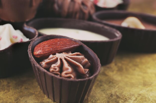 Chocolate sweets on a metal tray, closeup