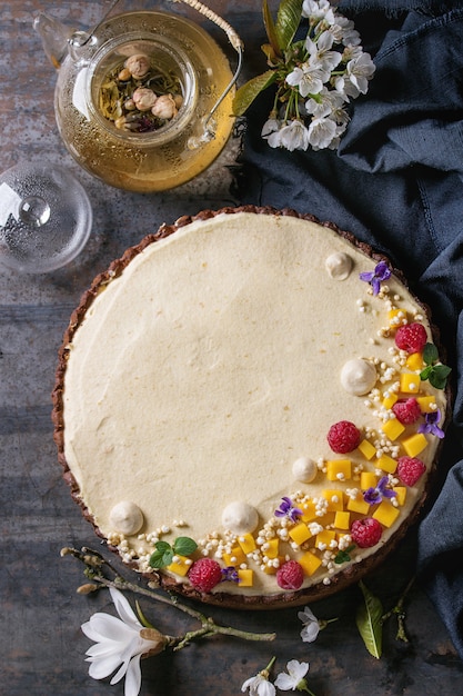 Chocolate tart with mango and raspberries