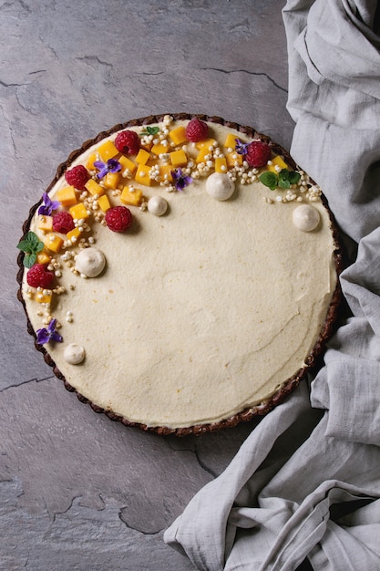 Chocolate tart with mango and raspberries