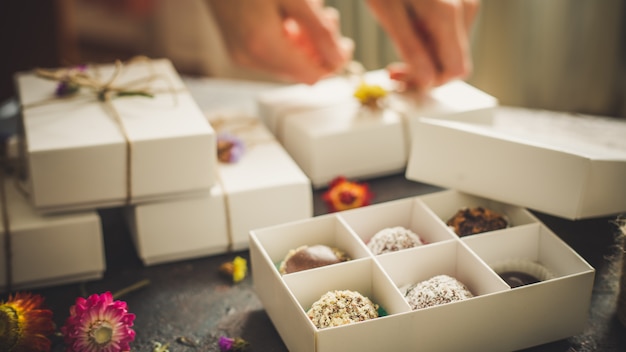 Chocolate truffle, candy in the box. Top view. 