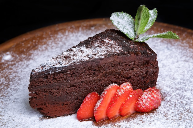 Chocolate truffle cheesecake with strawberries