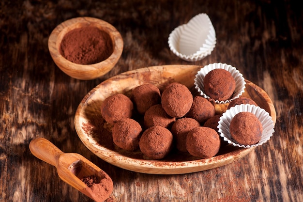 Chocolate truffles and cocoa powder