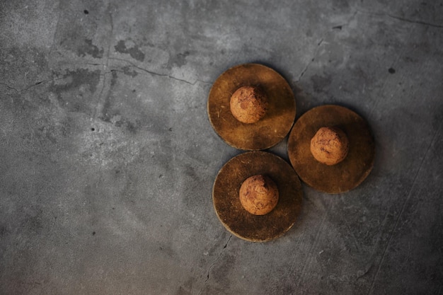 Chocolate truffles on dark background