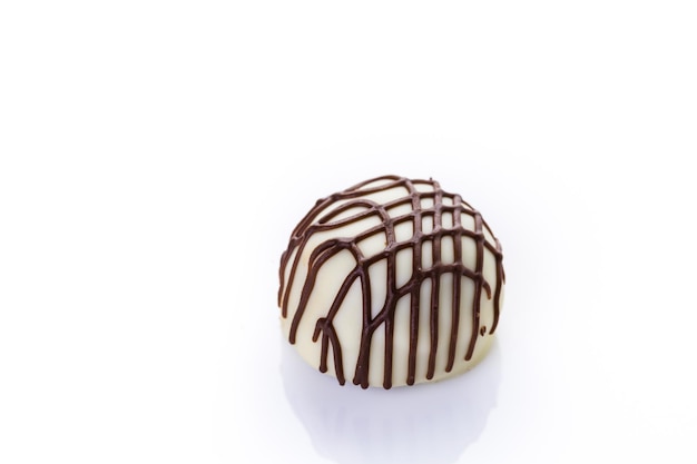 Chocolate truffles on a white background.