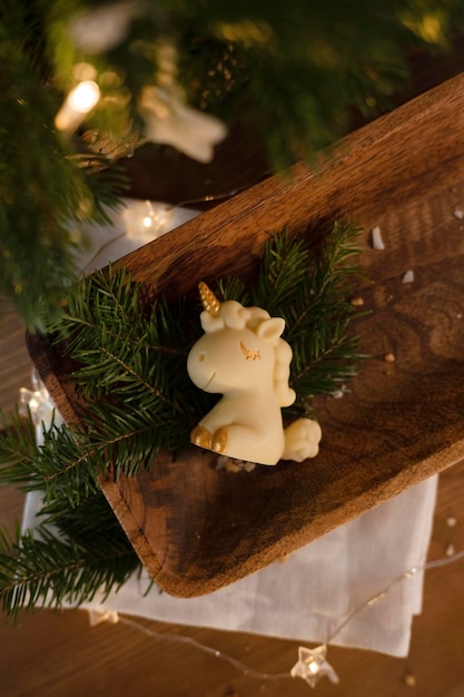 Chocolate unicorn on a wooden tray