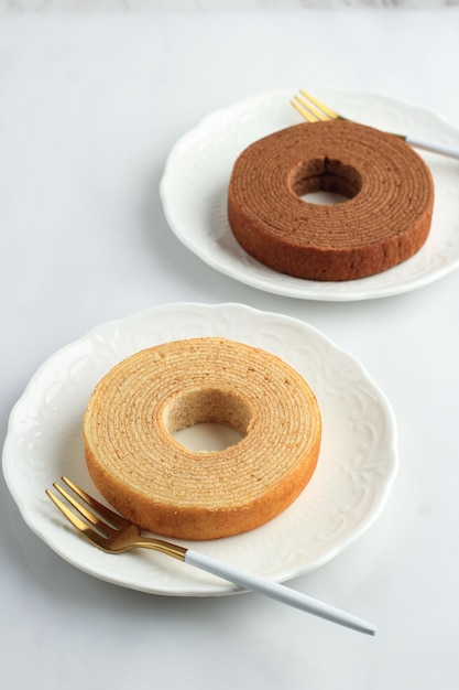 Chocolate and Vanilla Baumkuchen or Tree Cake Log Cake is a Kind of Spit Cake from German Cuisine Its also a Popular Dessert in Japan Copy Space for Text