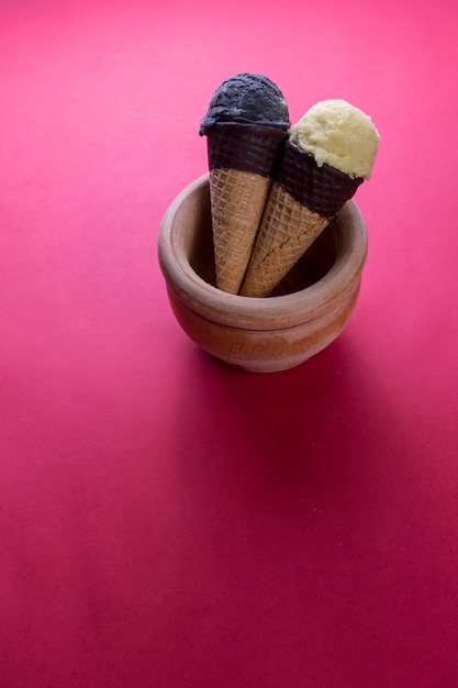 Chocolate and vanilla ice cream cones