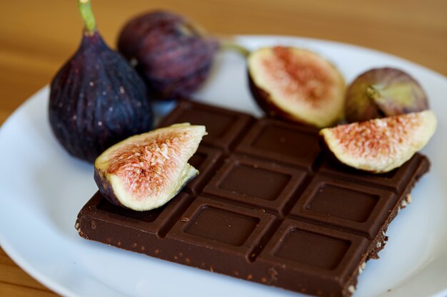 Chocolate With fruit Figs on white plate