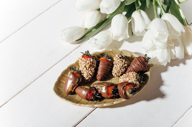 chocolatecovered strawberries on a light background