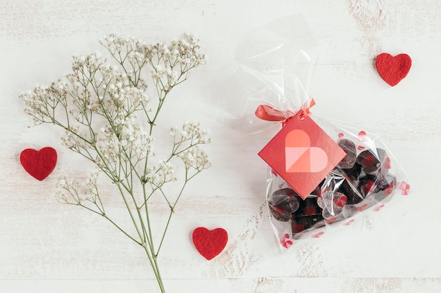 Chocolates bag with flowers and hearts