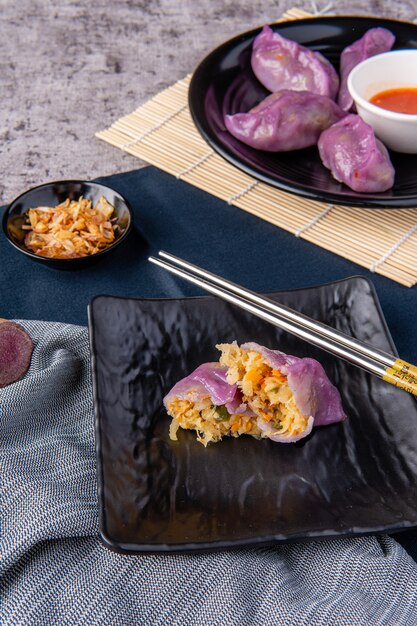 Choi pan steamed vegetable dumplings also known as Chai Kwe or Chai Kue is one of the many special traditional Asian delicacies and this Choi Pan is made from purple sweet potato