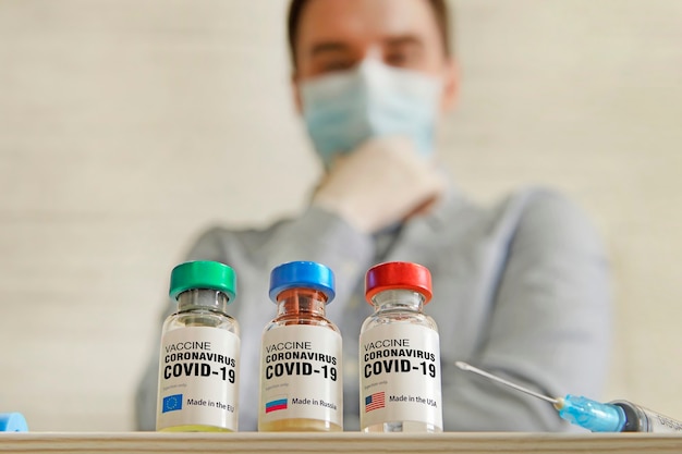 Choosing the best vaccine for vaccination made in USA or the EU. The medical conception of combating the covid-19 pandemic.