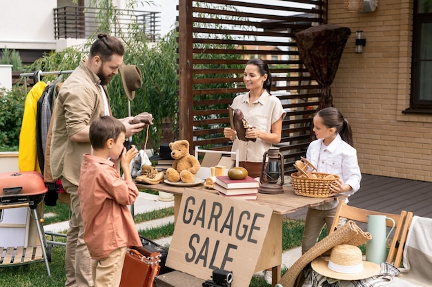 Choosing goods at garage sale