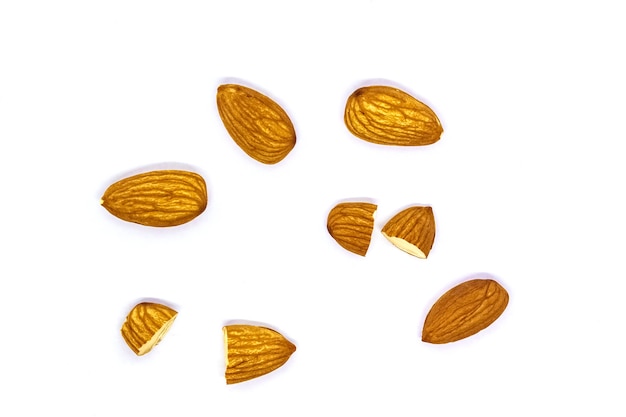 chopped almonds layout on white background isolated