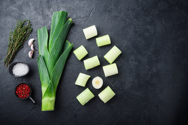 Chopped green leeks onion uncooked with herbs ingredients