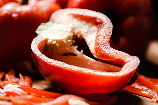 Chopped sweet pepper on a black table