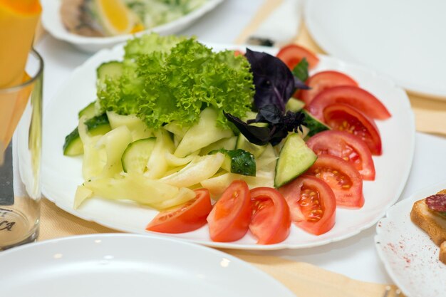 Chopped vegetables on the banquet table