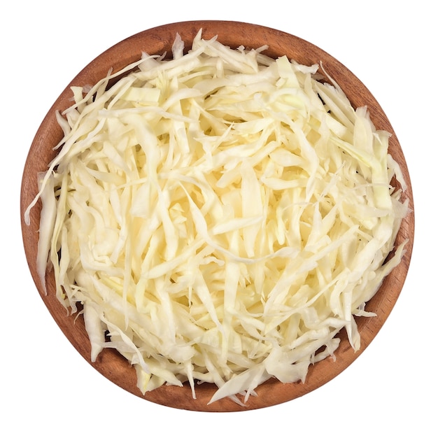 Chopped white cabbage in a wooden bowl on a white background