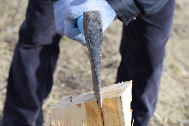 Chopping wood with an ax