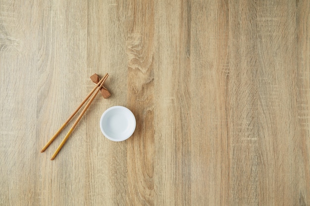 Chopsticks and white bowl