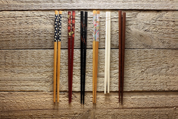 Chopsticks on Wooden Background