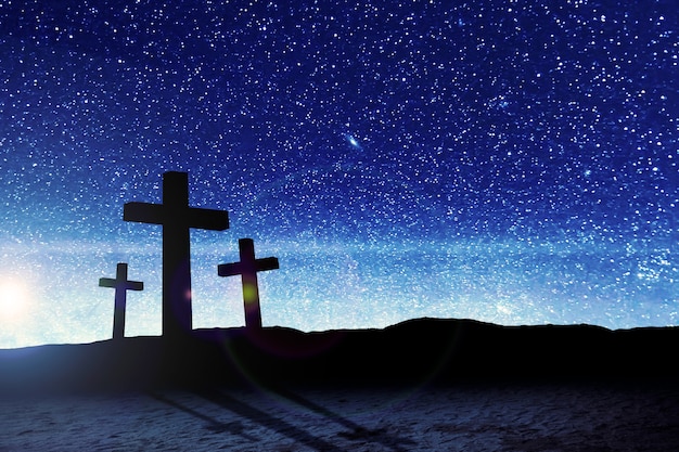 Christian Cross on the field with a night scene background