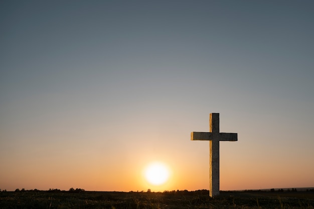 christian cross with nature landscape