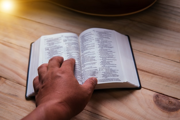 Christian hand while praying and worship for christian religion