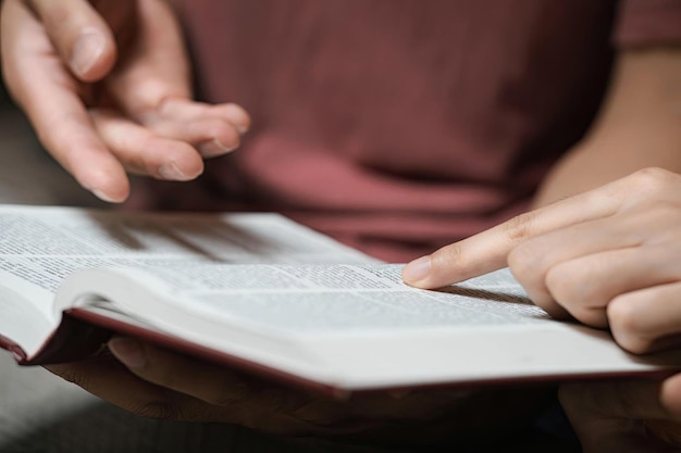 Christian religion concept Young couple reading bible to study God's love faith hope love