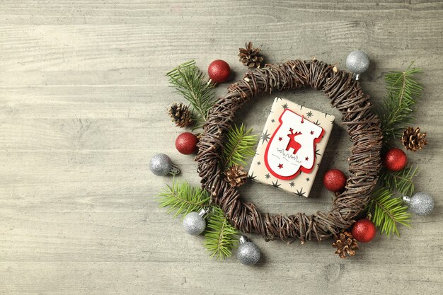 Christmas accessories on wooden background, space for text.