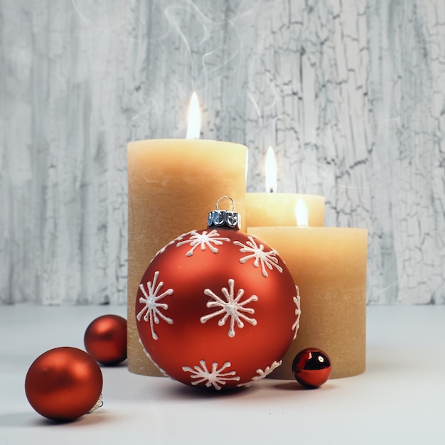 Christmas advent candles with red decorations, text space