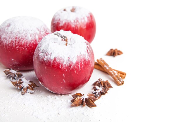 Christmas apples and spices isolated on white background