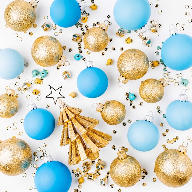 Christmas arrangement of bright christmas balls  on white background. Flat lay, top view