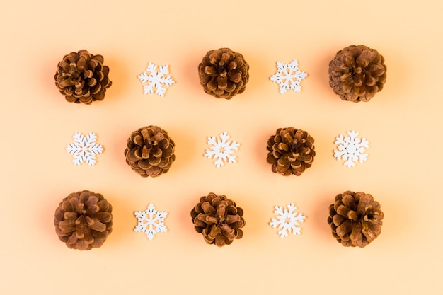 Christmas arrangement with pine cones and snowflakes