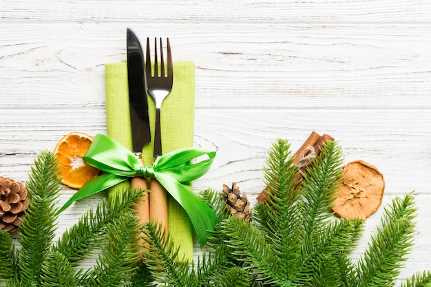 Christmas arrangement with tableware and bow