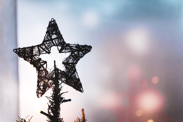 Christmas background of a beautiful decorated tree with lights and shiny balls