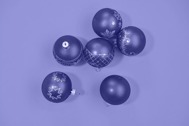 Christmas background and decor. New Year. very peri, Color of the year, 2022, blue, purple, Selective focus. Holiday.