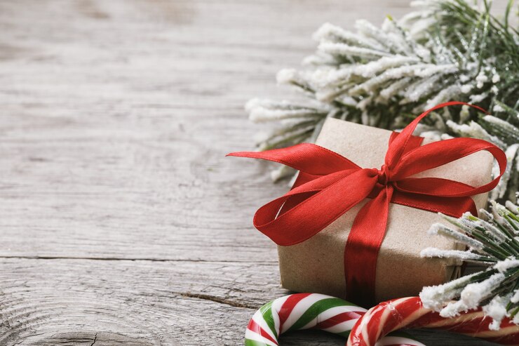 Photo christmas background and decorations on right side of wooden table with copy space
