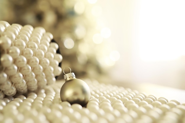 Christmas background Dish in the shape of a Christmas tree with balls decorations on the table